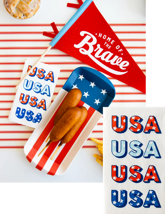 USA! USA! Decorative Guest Napkins with bold block letters staying U.S.A in different colors of red, baby blue and dark blue with white stars in the letters on a crisp white guest napkin
